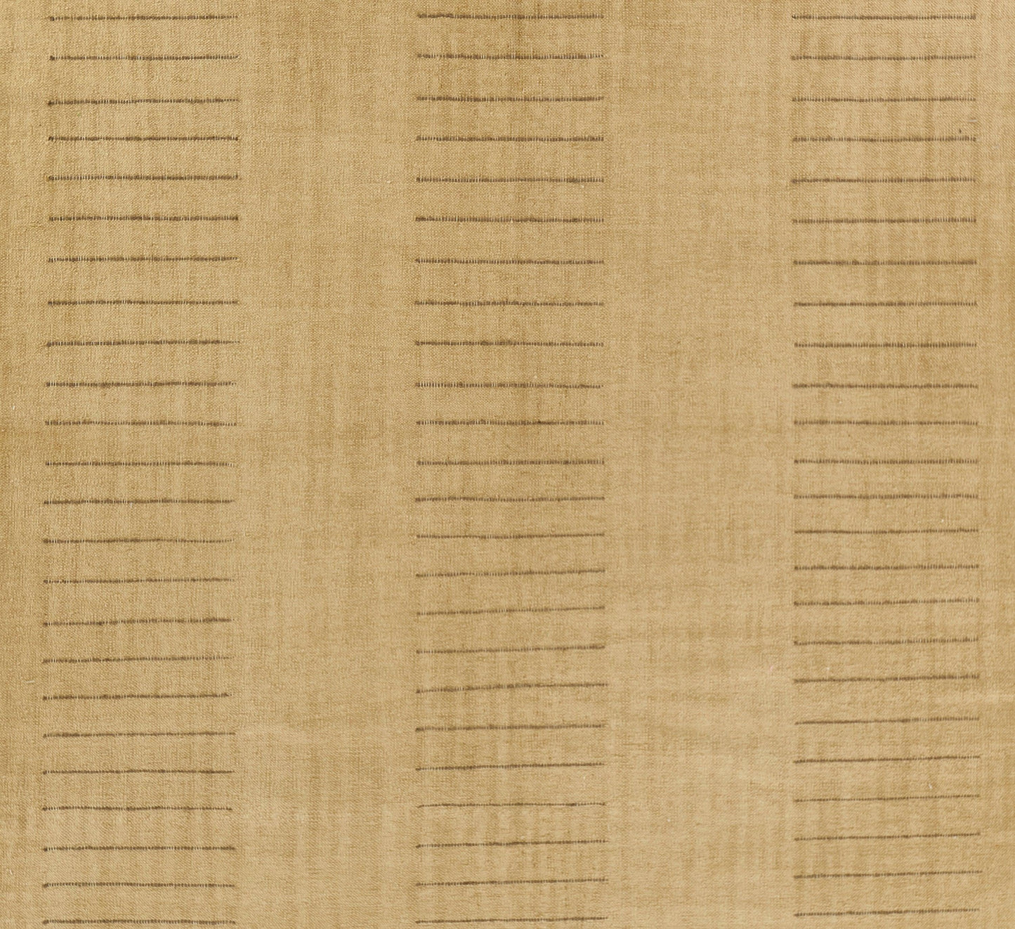 Beige woven rug with vertical bands of short brown dashes; neutral, contemporary decor.