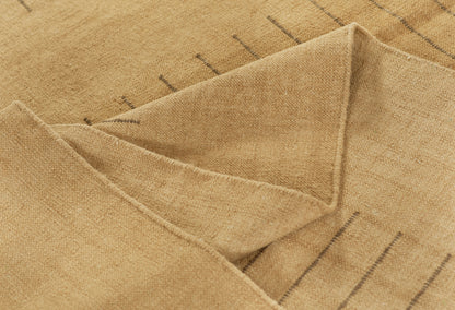Beige woven textile with a folded corner, soft cotton-linen feel and subtle dark stripes.