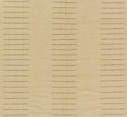 Beige woven fabric with vertical columns of short brown dashes in a geometric stripe pattern; upholstery textile.