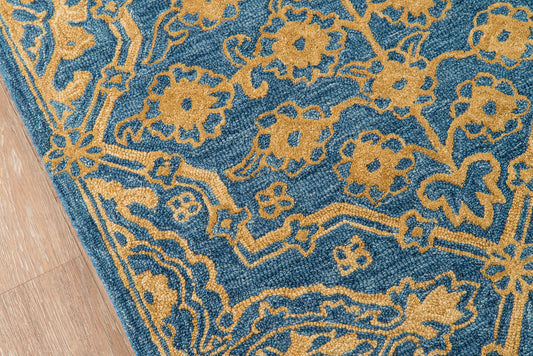 Blue rug with yellow floral damask pattern, woven texture, rectangular, ideal for living room floor decor.
