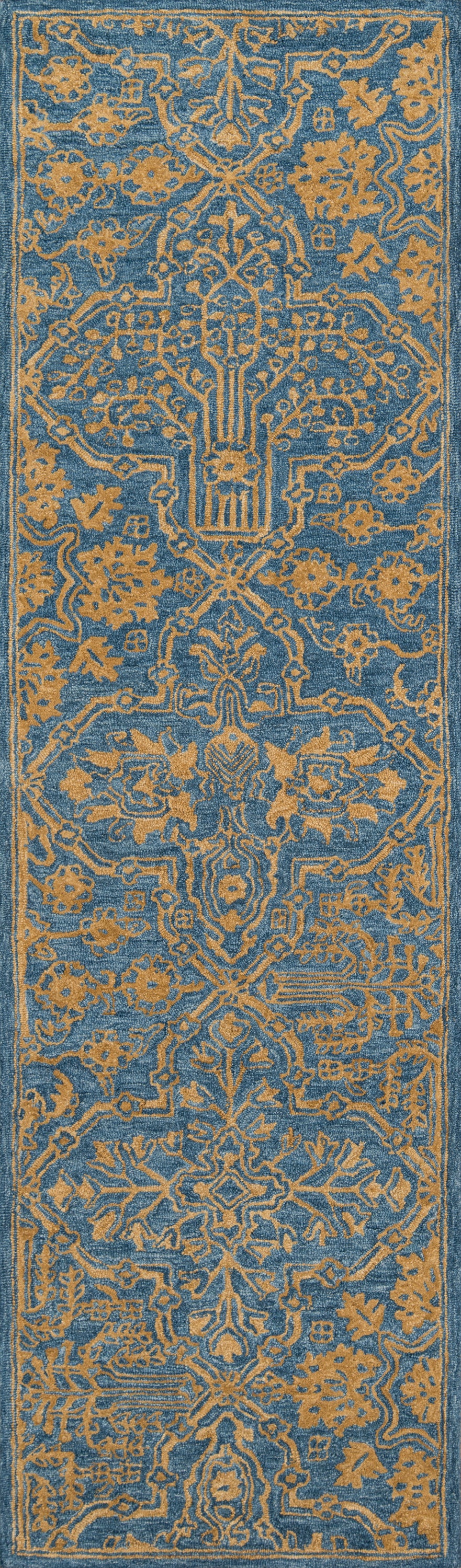 Blue rug with intricate gold floral and geometric motifs and a decorative border in Persian-inspired design.