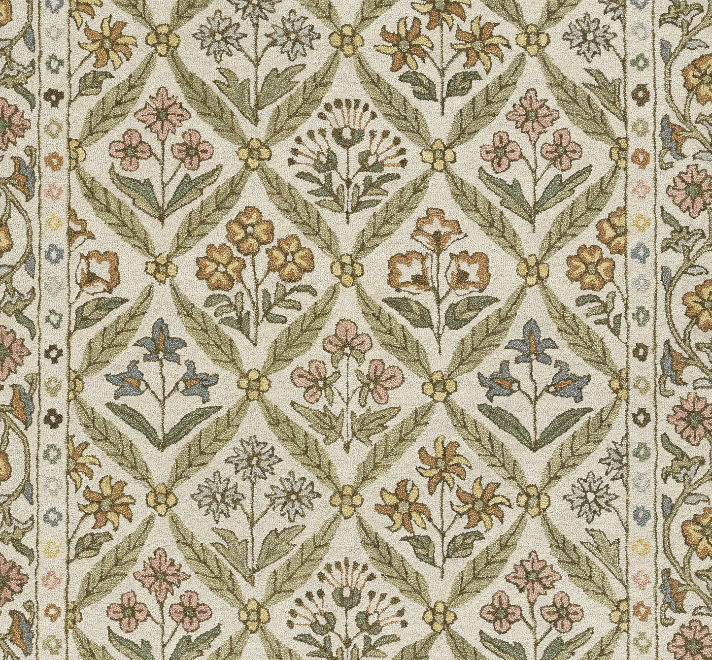 Cotswold-inspired woven rug with green trellis lattice & pastel floral motifs on beige background