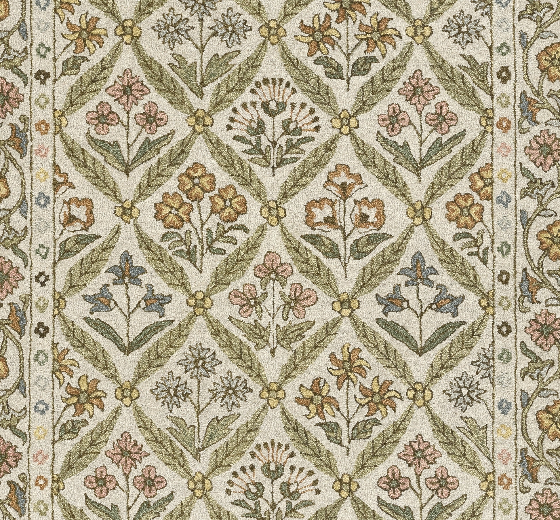 Cotswold-inspired woven rug with green trellis lattice & pastel floral motifs on beige background