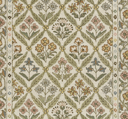 Cotswold-inspired woven rug with green trellis lattice & pastel floral motifs on beige background