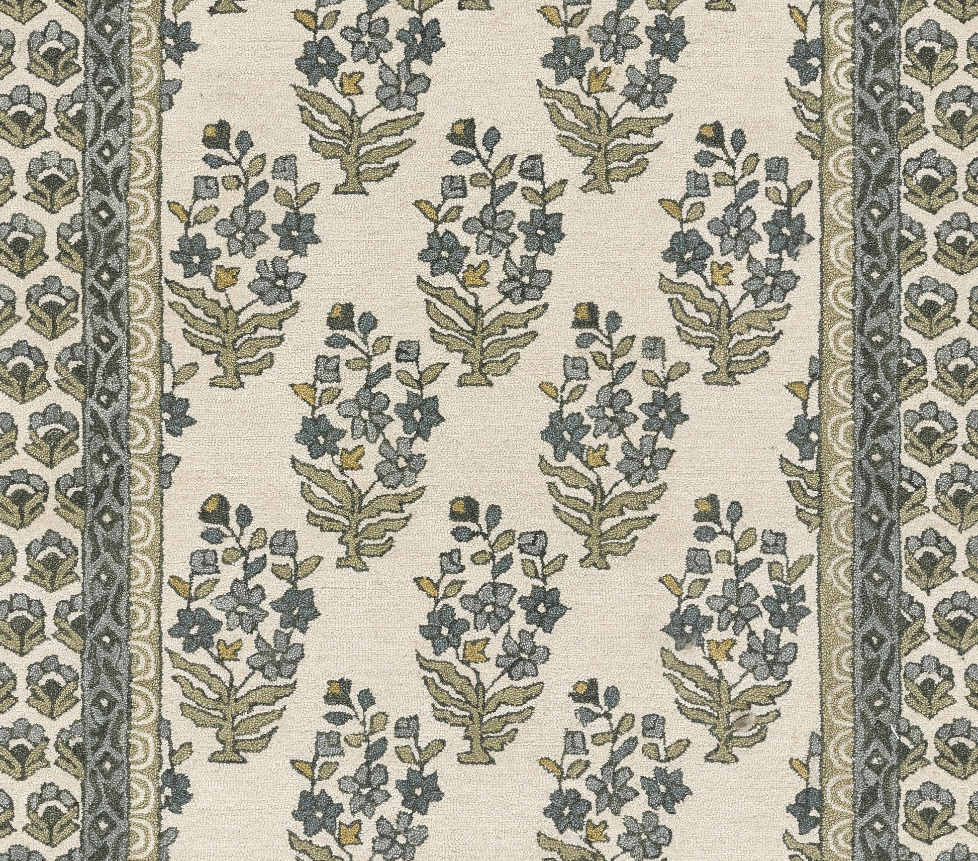 Cream fabric with blue-green floral sprigs and bordered scroll motifs; vintage botanical pattern.
