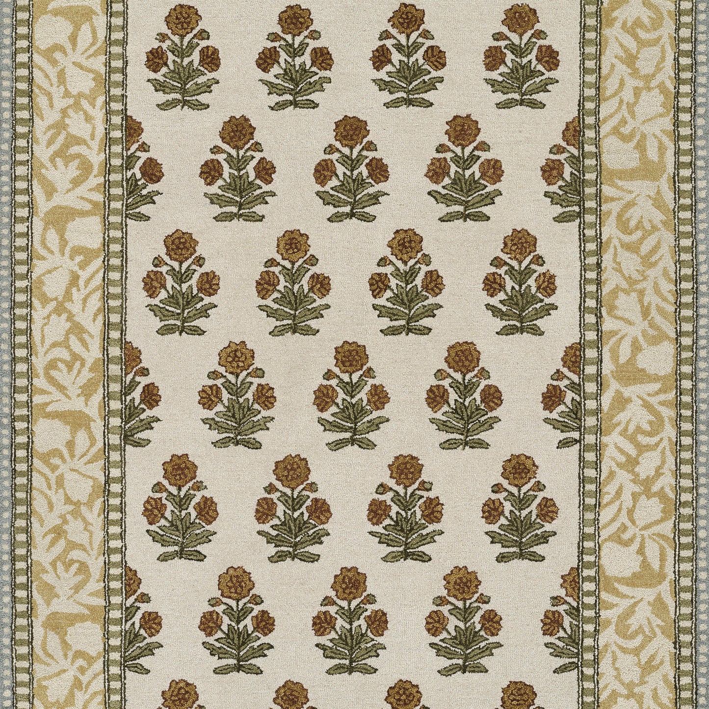 Beige woven rug with repeating brown-orange floral bouquets and green leaves; gold-cream border, traditional style.
