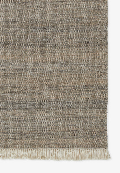 Gray-taupe flat-weave rug strip with subtle texture and fringed bottom edge.