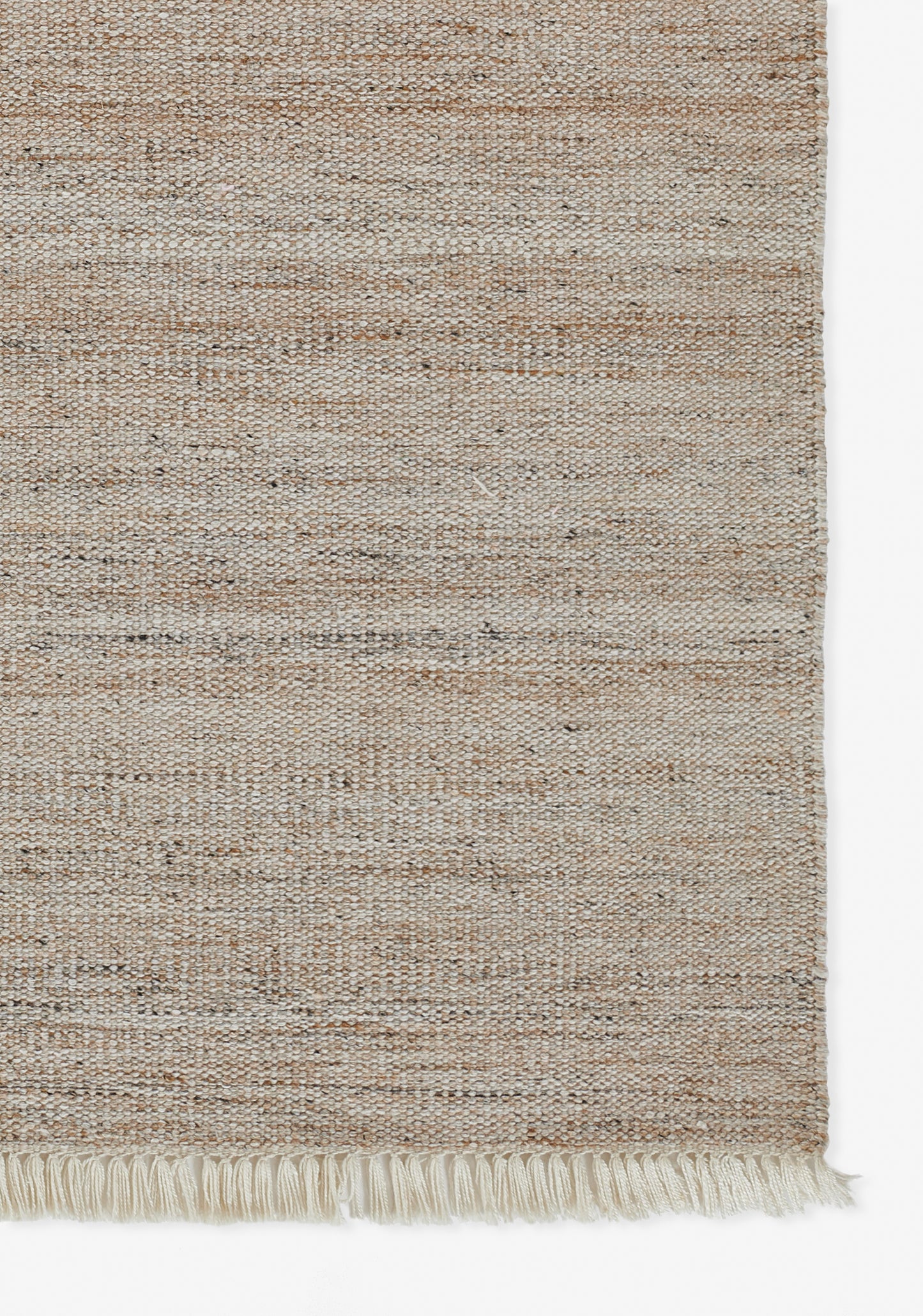 Natural beige flat-weave rug with subtle texture and fringe along bottom edge.