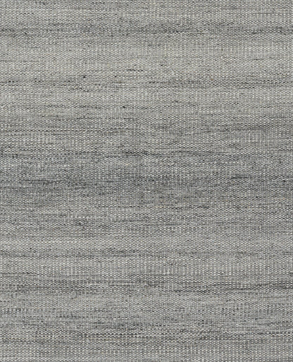 Gray heathered woven fabric texture; soft, neutral upholstery or rug material.