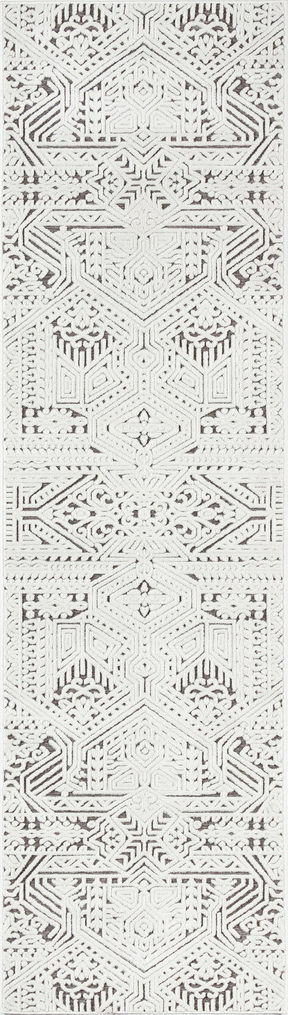 White geometric rug runner with vertical repeating diamond and hex motifs, embroidery-style pattern.