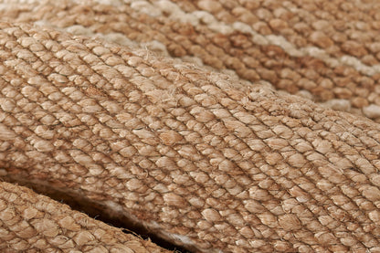 Beige textured rug with a broken stripe pattern; close-up of woven fibers, 8' x 10'.