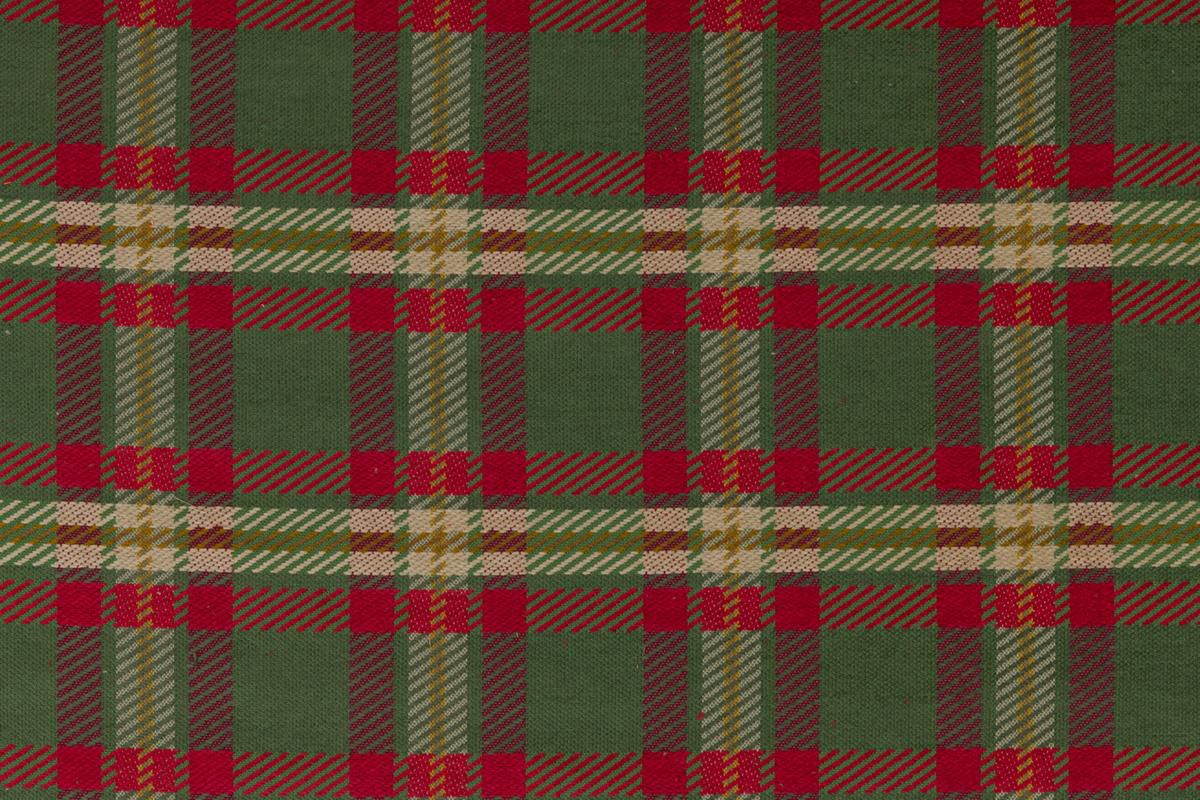 Green tartan plaid fabric featuring red squares with white and gold stripes.