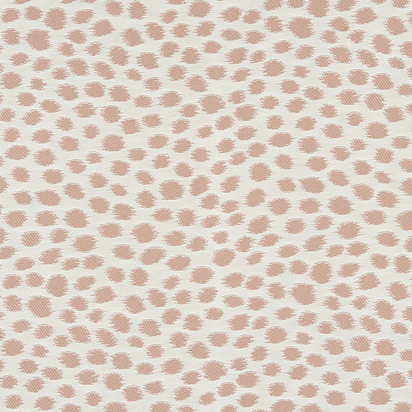 Dalmatian-print fabric with soft pink brush-stroke spots on cream background.
