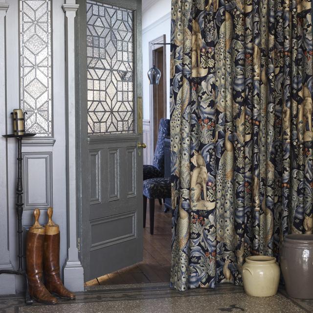 Morris & Co Forest Indigo fabric 85% viscose 15% linen with tapestry-inspired botanical, bird, and animal motifs — perfect for upholstery, curtains, and decorative home projects.