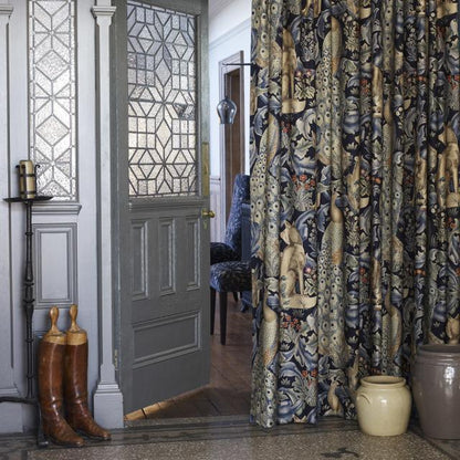 Morris & Co Forest Indigo fabric 85% viscose 15% linen with tapestry-inspired botanical, bird, and animal motifs — perfect for upholstery, curtains, and decorative home projects.