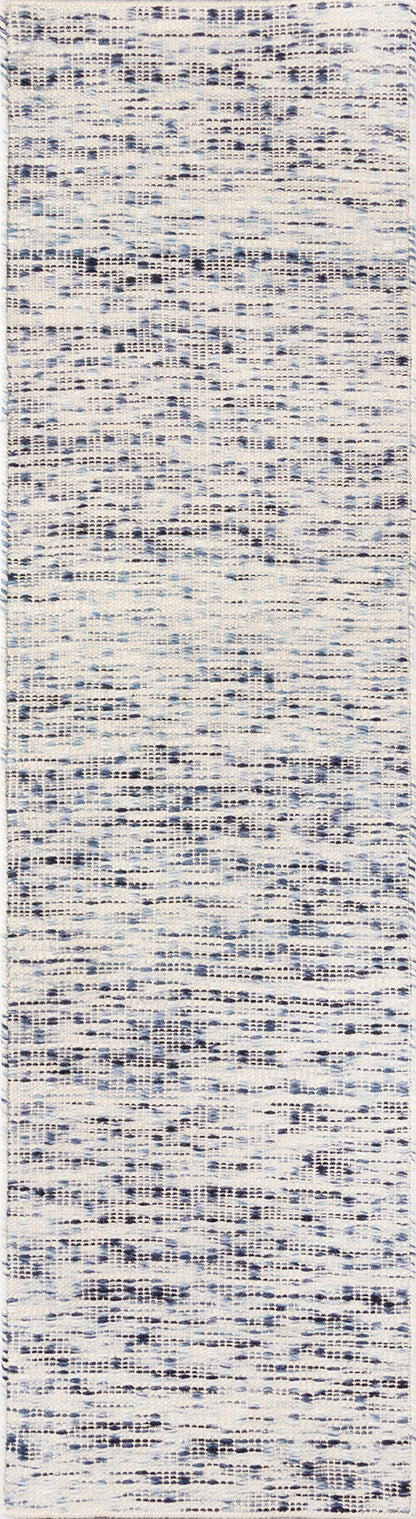 Textured cream and blue woven rug with navy specks; rectangular hallway or entryway decor for contemporary spaces.