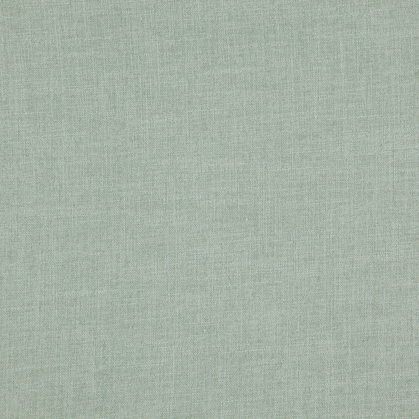 Sage green linen-textured fabric close-up with subtle woven pattern for upholstery or drapery.