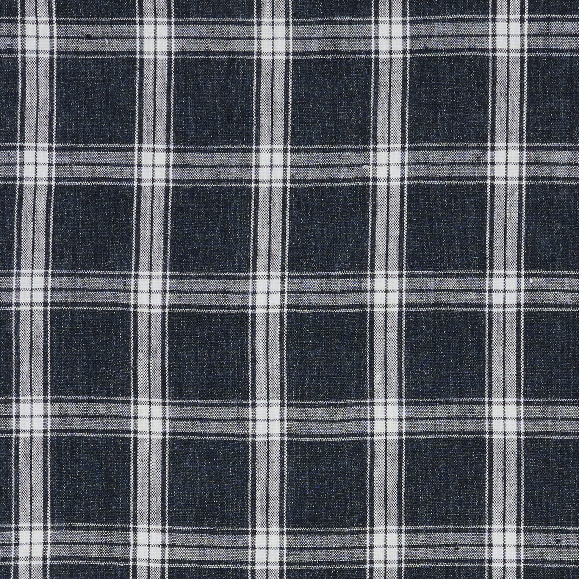 Charcoal plaid fabric with white grid lines forming square pattern; classic woven textile.