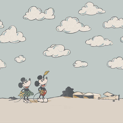 Disney Home x Sanderson Mickey in the Clouds wallpaper mural featuring Mickey Mouse flying through soft pastel clouds and airplanes in a whimsical vintage sky design. Classic Disney nursery wallpaper ideal for kids bedrooms, playrooms, and Disney themed interiors. Dreamy cloud wallpaper mural perfect for nursery décor, feature walls, children’s room design, and vintage Disney home styling.