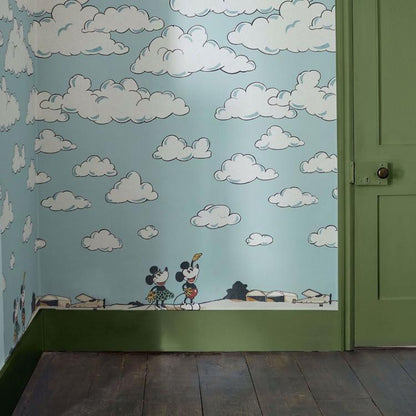 Disney Home x Sanderson Mickey in the Clouds wallpaper mural featuring Mickey Mouse flying through soft pastel clouds and airplanes in a whimsical vintage sky design. Classic Disney nursery wallpaper ideal for kids bedrooms, playrooms, and Disney themed interiors. Dreamy cloud wallpaper mural perfect for nursery décor, feature walls, children’s room design, and vintage Disney home styling.