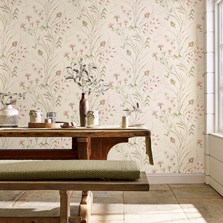 Sanderson Summer Harvest DEBB216495 wallpaper displayed on a feature wall; elegant trailing botanical pattern in claret and olive tones with floral and foliage detailing from the Embleton Bay collection.