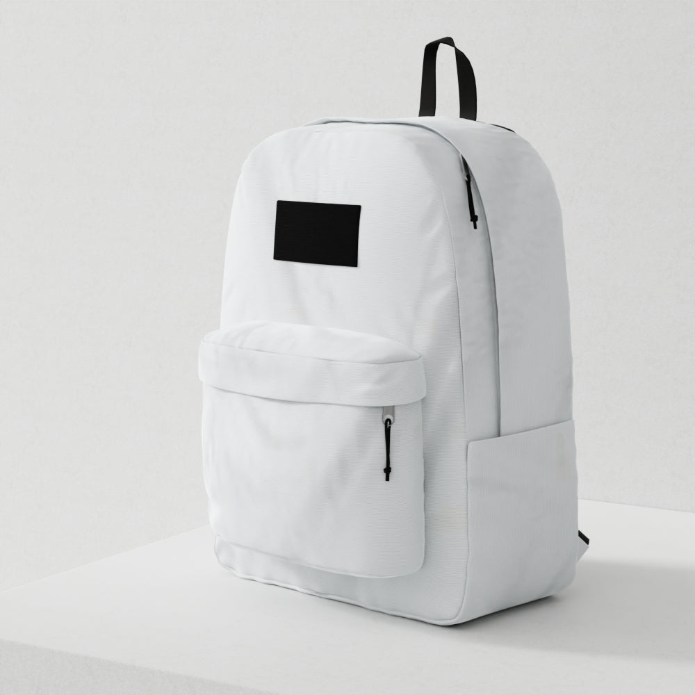 White backpack with black patch on front, front zipper pocket, side pockets, and black top handle.