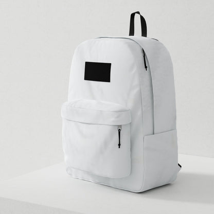White backpack with black patch on front, front zipper pocket, side pockets, and black top handle.