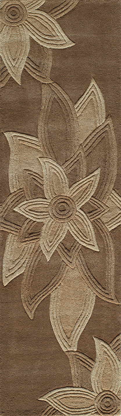 Brown area rug with a large cream floral motif and decorative woven design.
