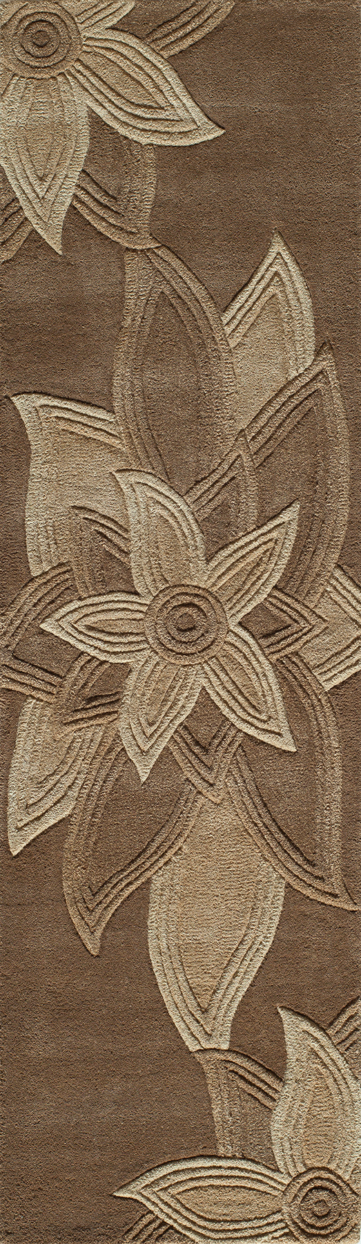 Brown rug featuring a large beige floral design with embossed petals; woven textile, decorative floor accent.