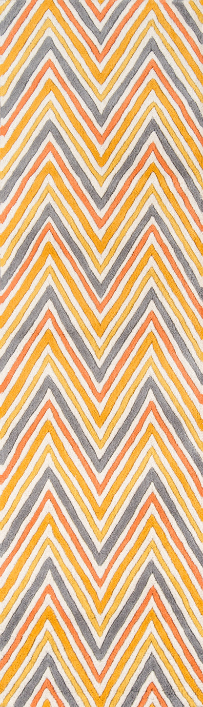 Chevron zigzag rug pattern in orange, yellow and gray tones; bold repeats ideal for use as an area rug or decor