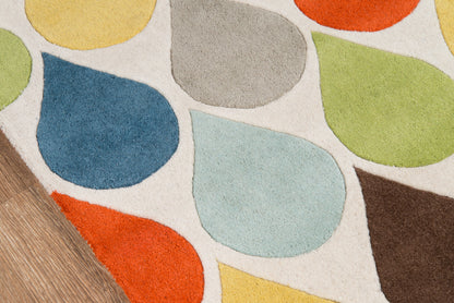 Multicolor abstract runner rug with rounded teardrop shapes in yellow, blue, red, green & gray on cream background.