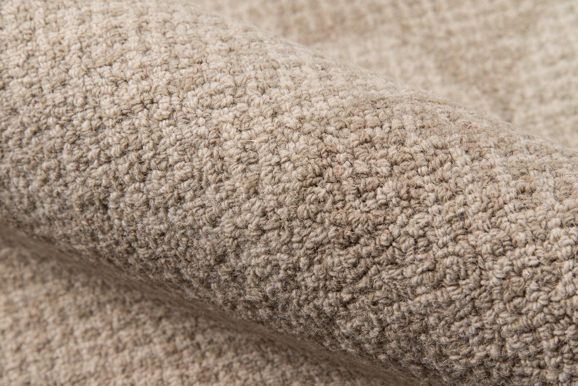 Beige boucle fabric close-up with chunky looped pile; rug texture, 4' x 6' rug.