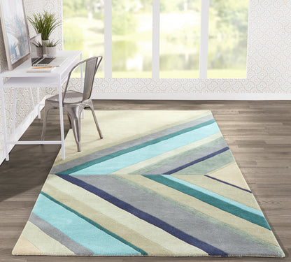 Geometric striped runner in blues, teals, beige and gray diagonals for a modern home office.