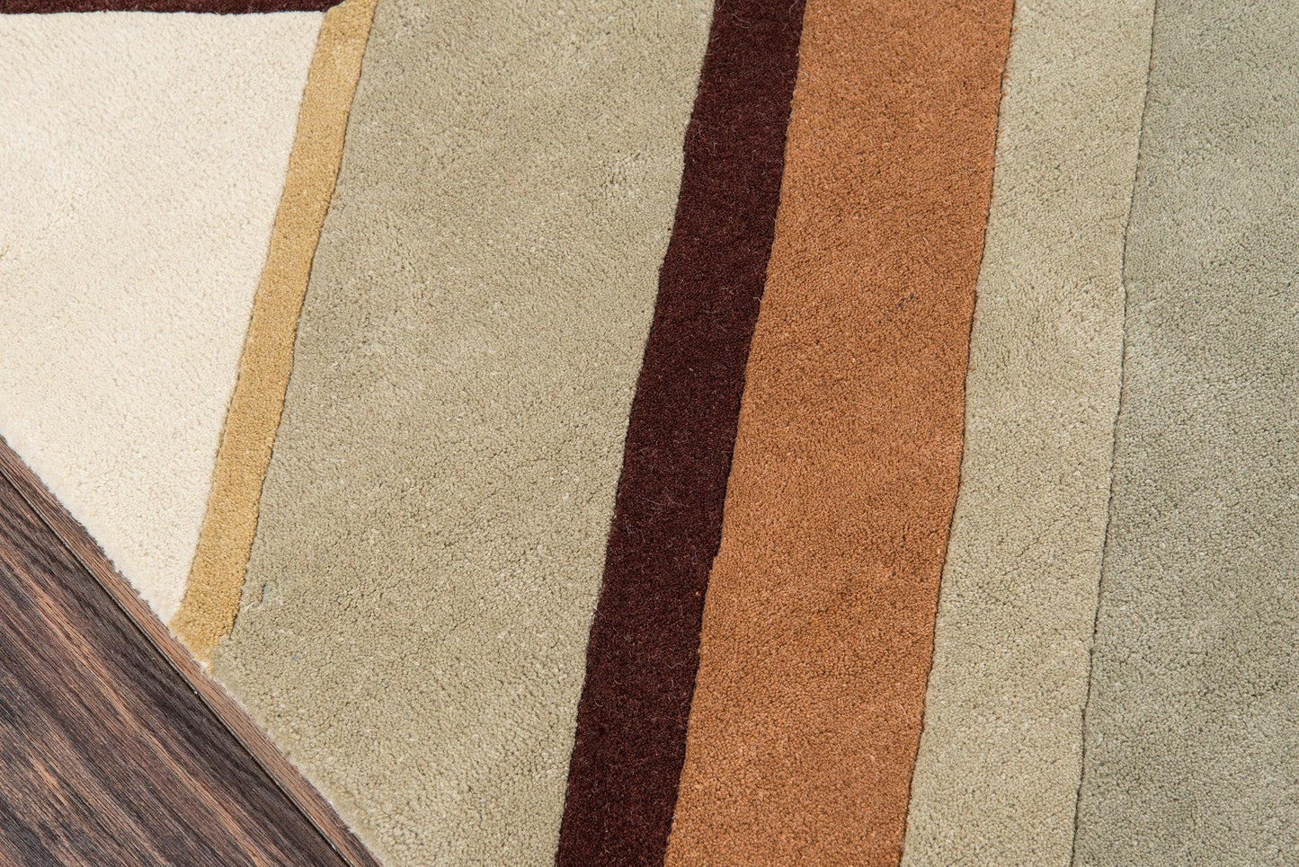 Rectangular area rug with earthy vertical stripe blocks in cream, beige, taupe, brown & olive.