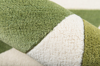 Close-up of olive green and ivory boucle rug with thick loop pile.