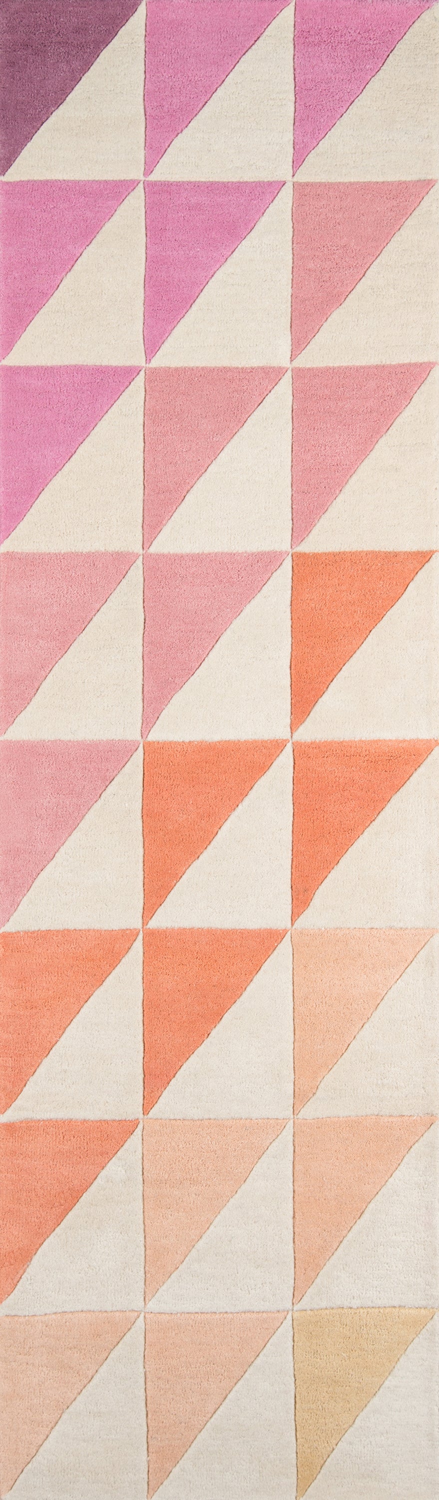 Rug with pink, peach and cream diagonal triangles forming a chevron geometric pattern (5' x 8').