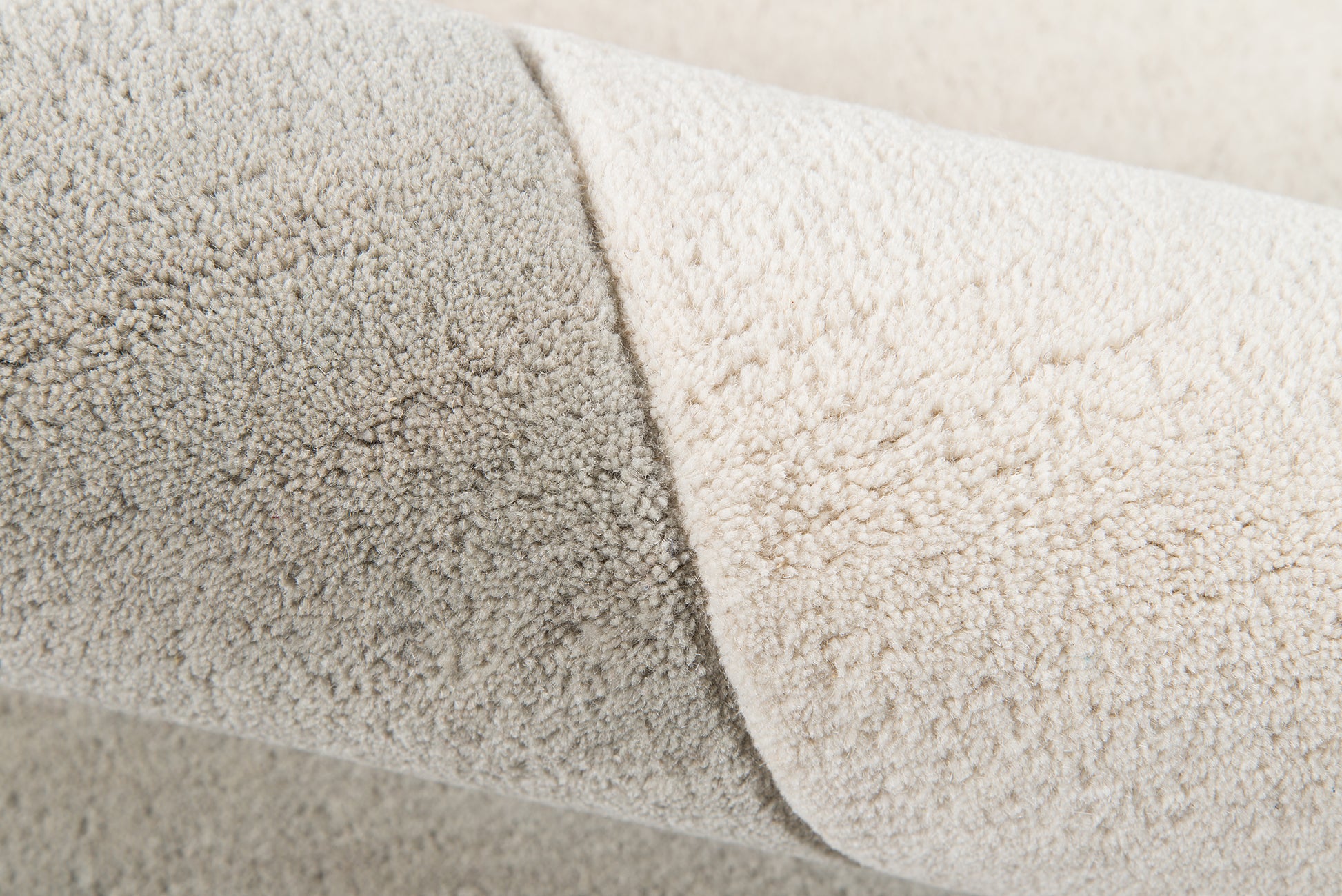 Grey & cream boucle runner with plush pile, rolled to show texture; 2' x 8' runner for modern & cozy home decor.