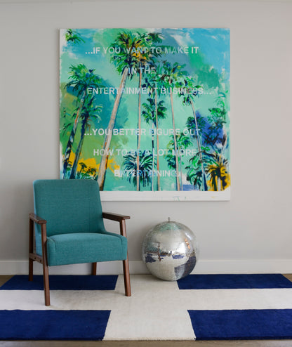Navy area rug on a modern living room floor.