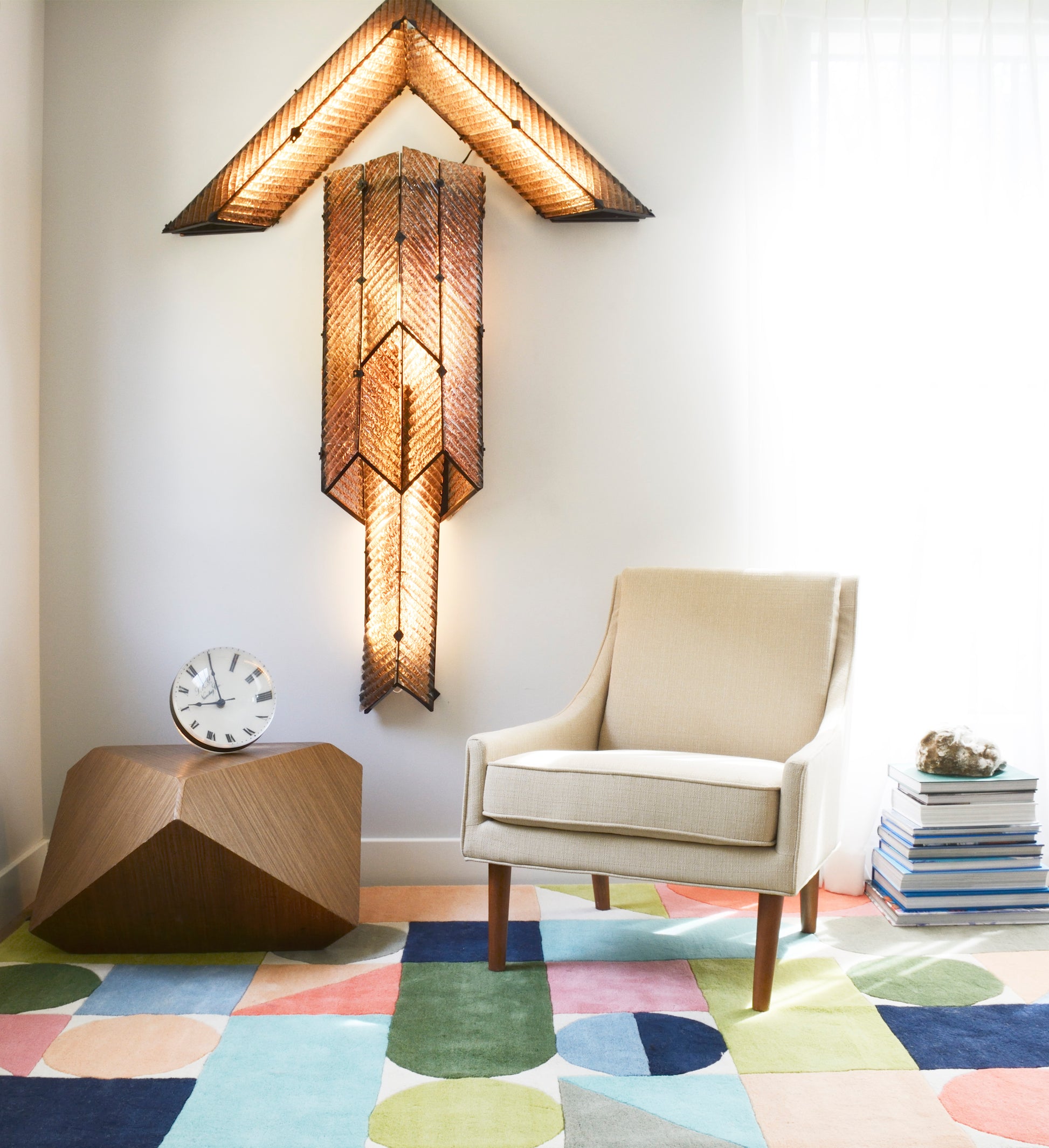 Amber-toned geometric patchwork rug, 9' x 12'.