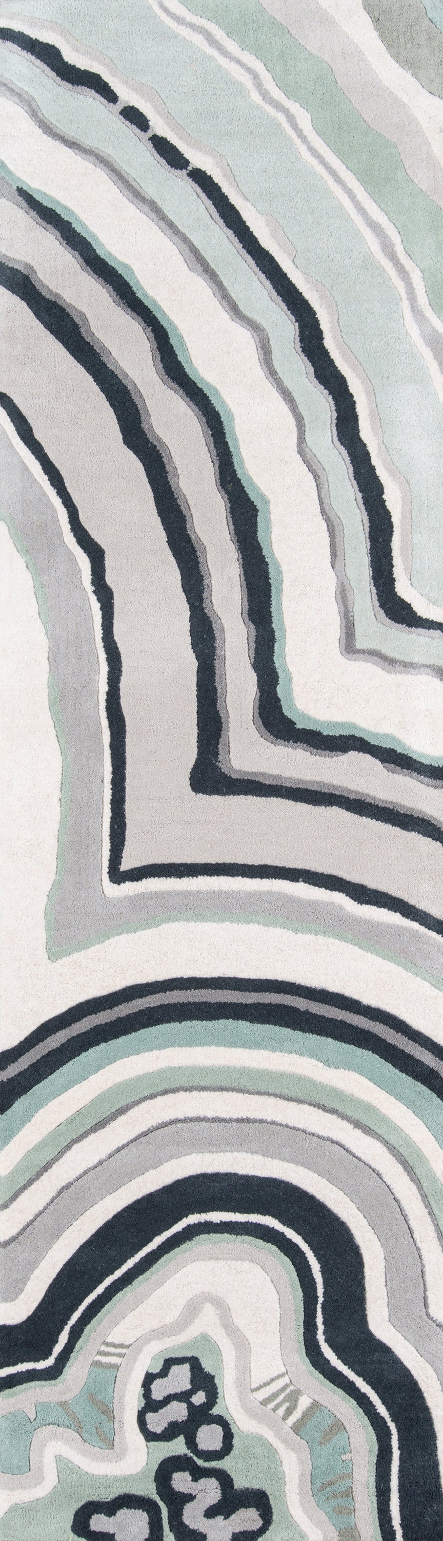 Abstract wavy concentric stripes in blues, grays & whites; textile pattern with arc shapes.