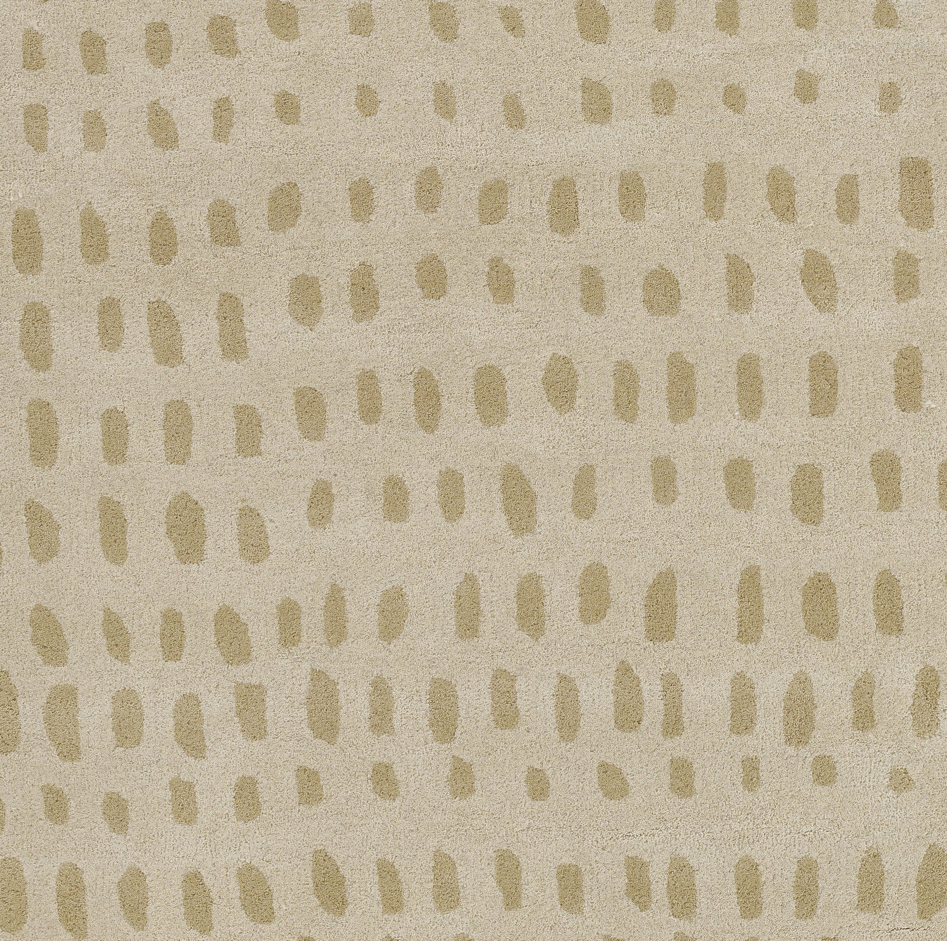 Beige rug with tan brushstroke dot pattern; soft woven texture, versatile modern decor.