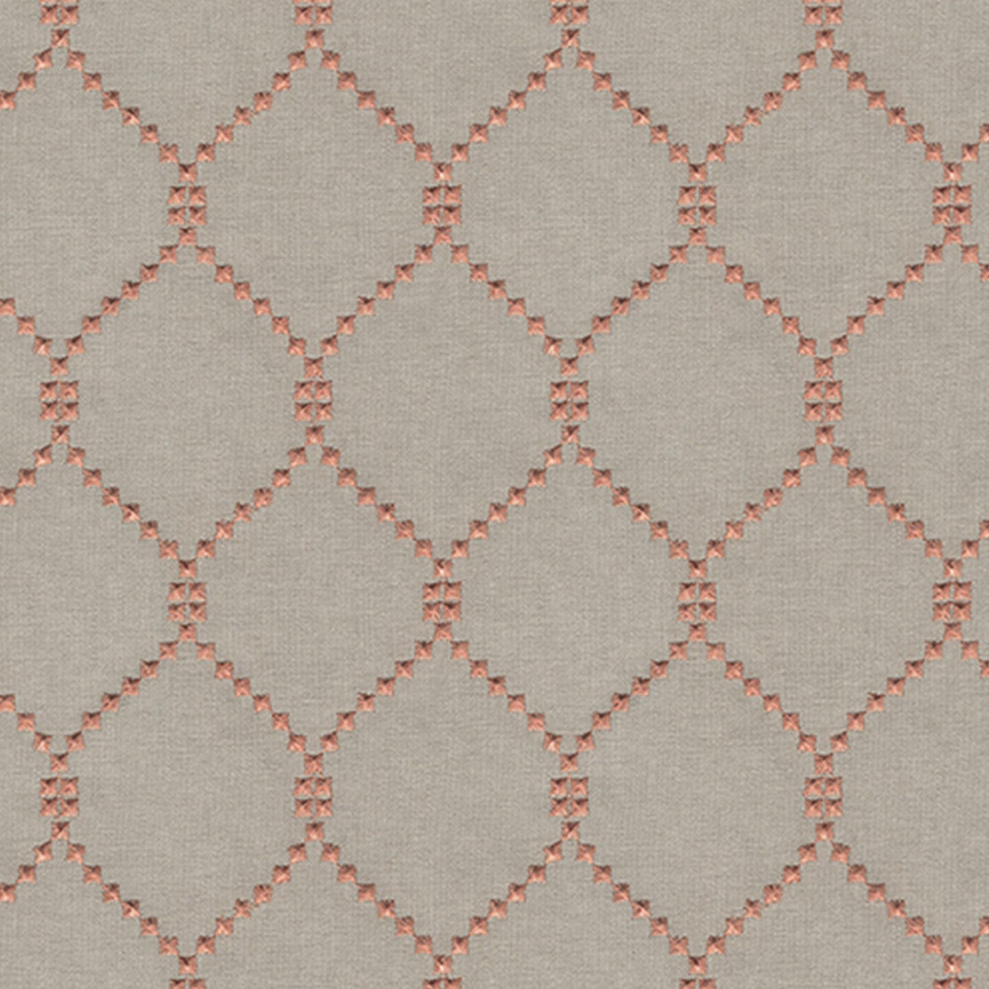 Orange/Rust embroidered diamond pattern on linen-textured fabric.
