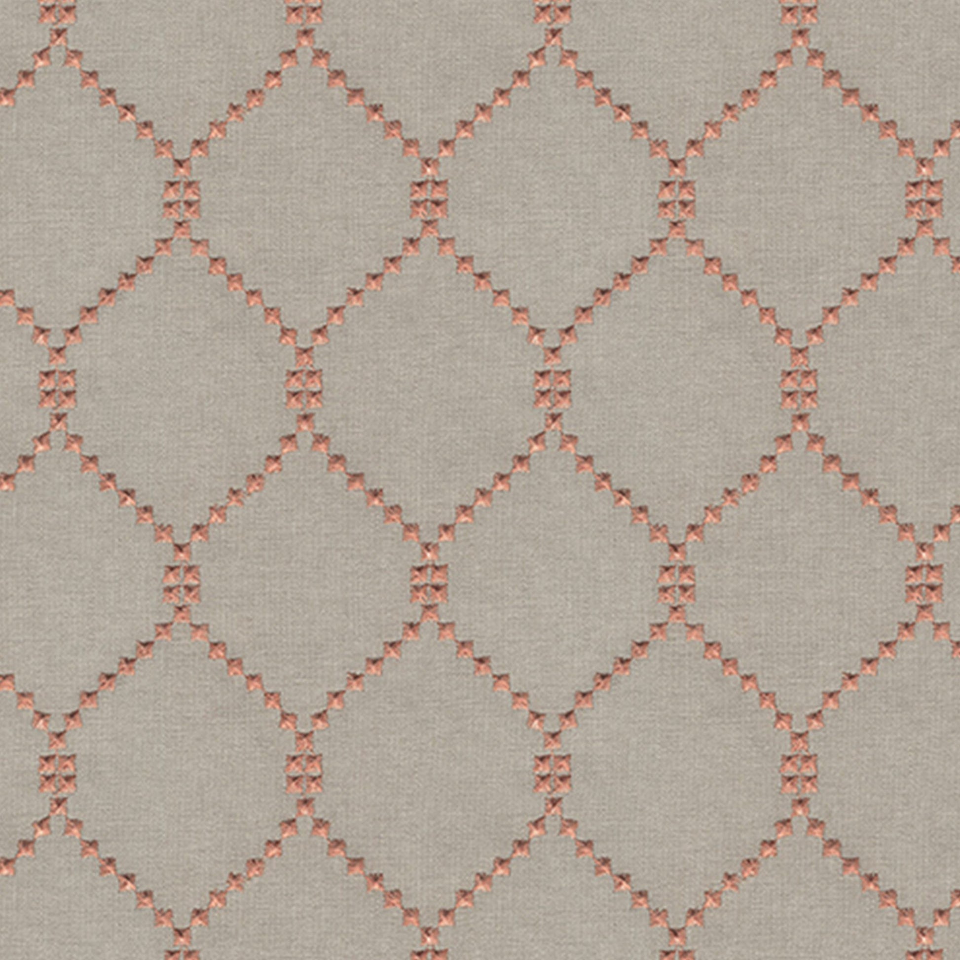 Orange/Rust embroidered diamond pattern on linen-textured fabric.