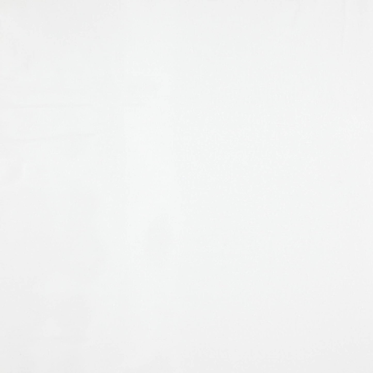 White fabric with subtle creases, clean minimalist backdrop.