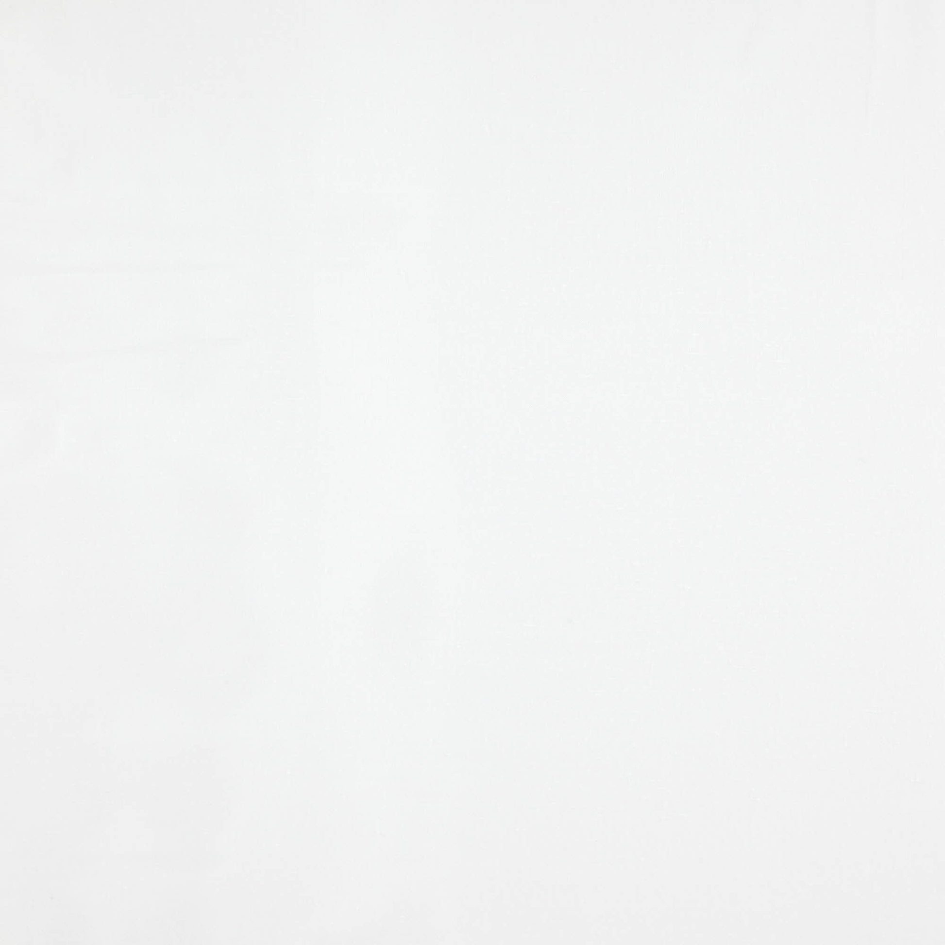 White fabric with subtle creases, clean minimalist backdrop.