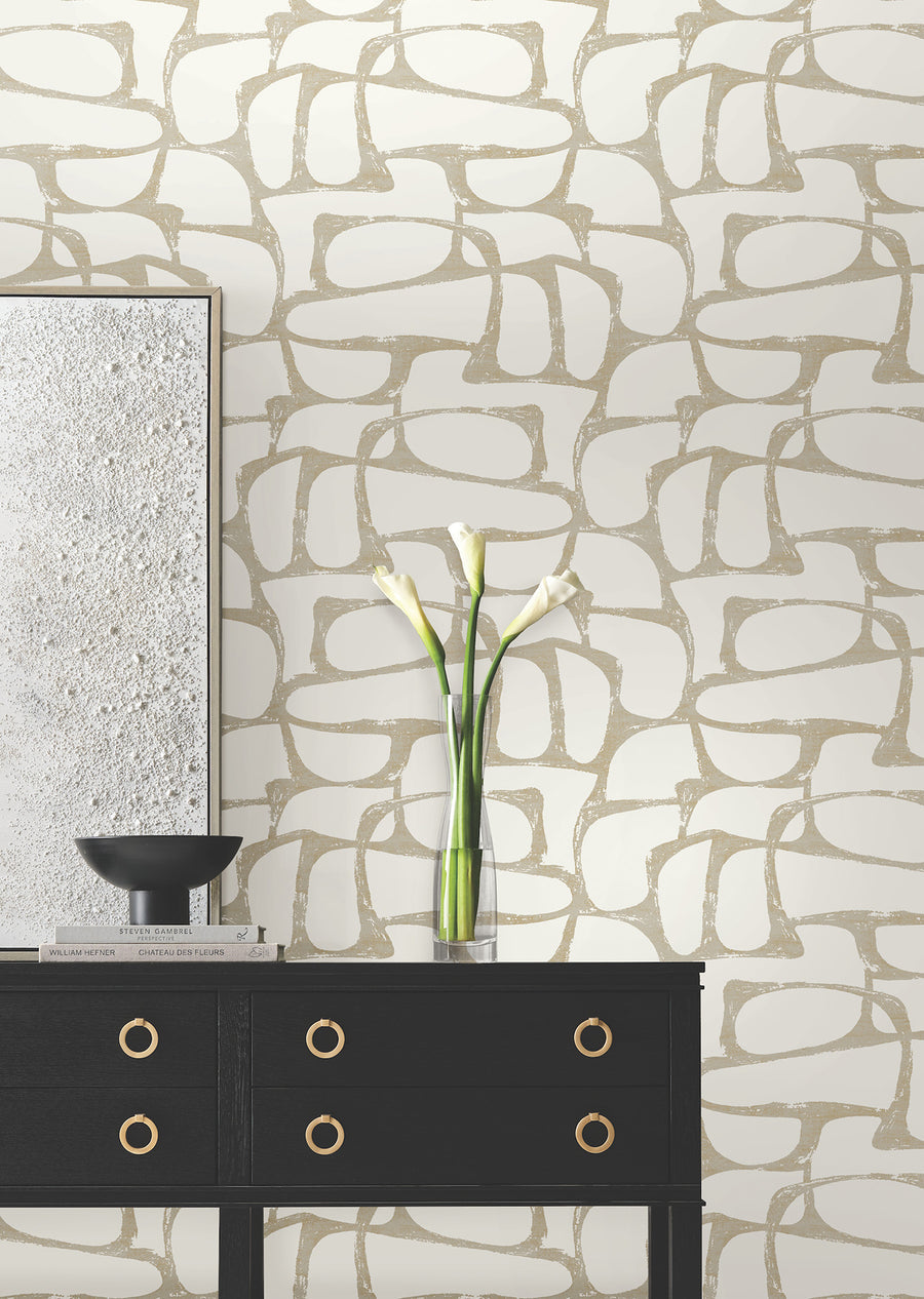 Luxury white and gold geometric wallpaper with free-form organic shapes and textured dimension, designed by Candice Olson for sophisticated bedrooms, living rooms, dining rooms, and accent walls.