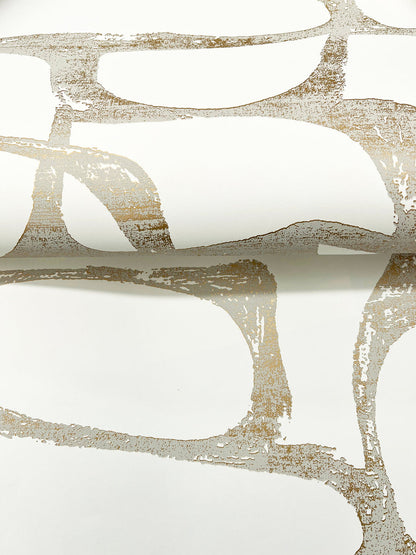 White and gold Candice Olson geometric wallpaper featuring dimensional raised organic shapes and metallic gold accents, creating an elegant modern luxury wall design.