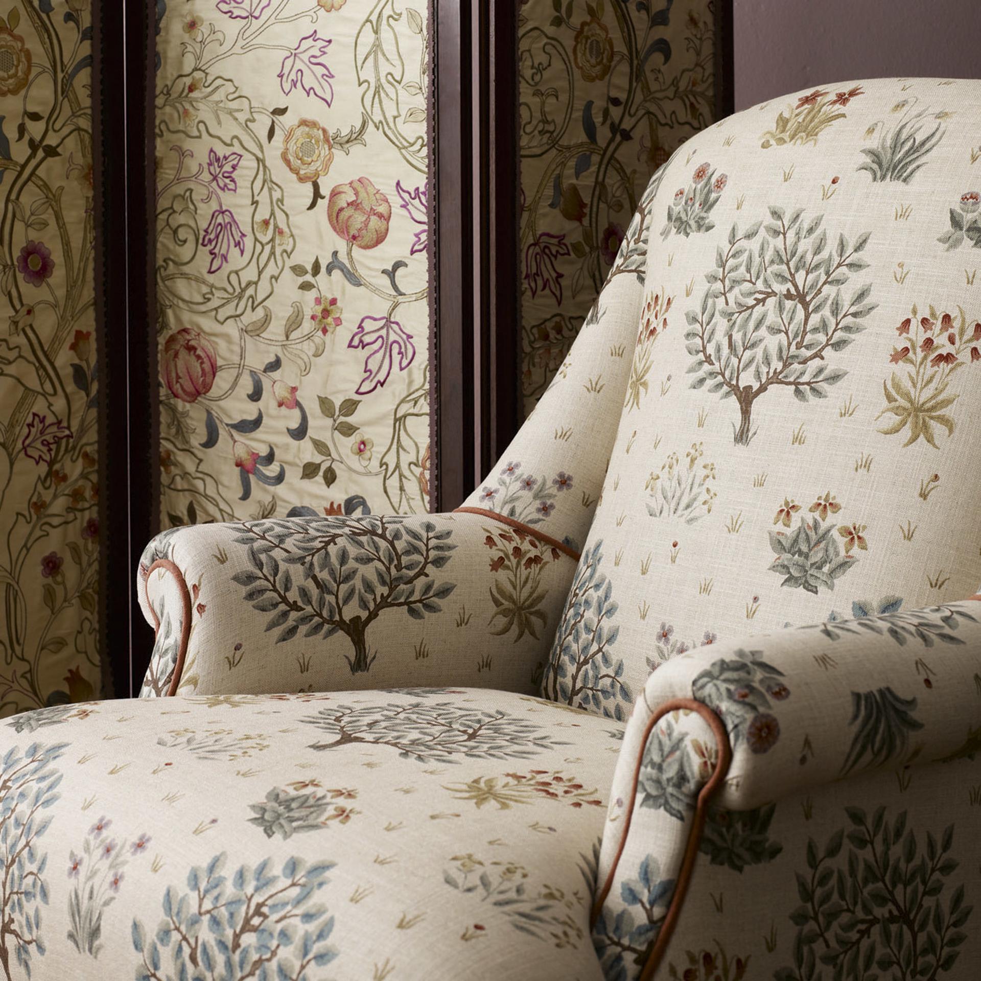 High-quality Morris & Co Orchard Fabric in Bayleaf & Rose, featuring medieval-inspired trees and foliage on textured linen-mix, perfect for drapes, cushions, upholstery, and luxury home décor projects.