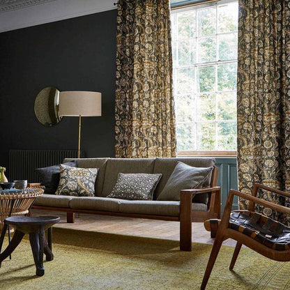 Morris & Co. Wandle Fabric in Charcoal/Mustard showing the striped, meandering diagonal branch and floral motifs on 100% linen — ideal for upholstery, drapery and luxury décor