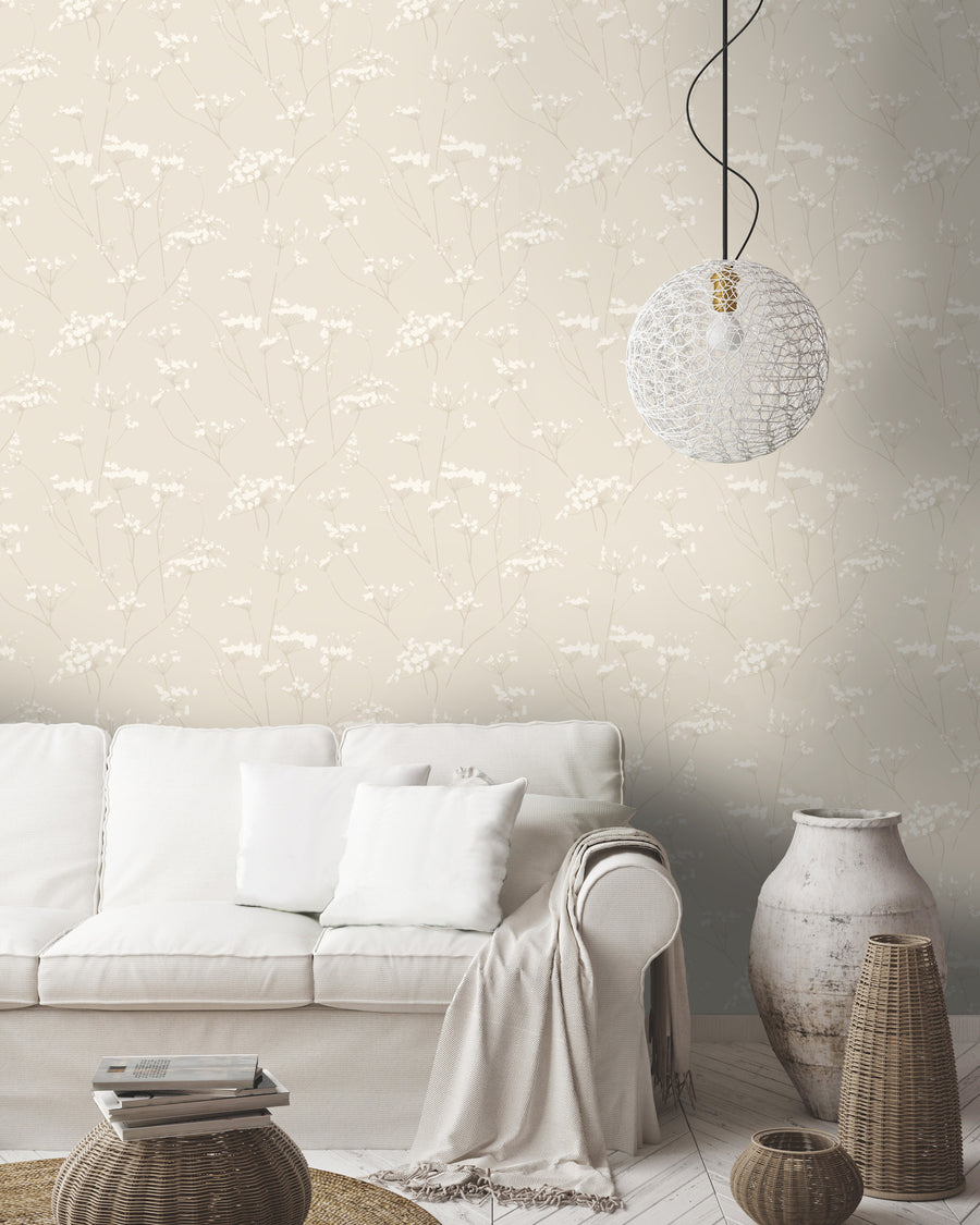 Cream floral wallpaper with dainty wildflowers and slender taupe stems, ideal for bedroom decor, living room accent walls, nurseries, and timeless botanical interiors.